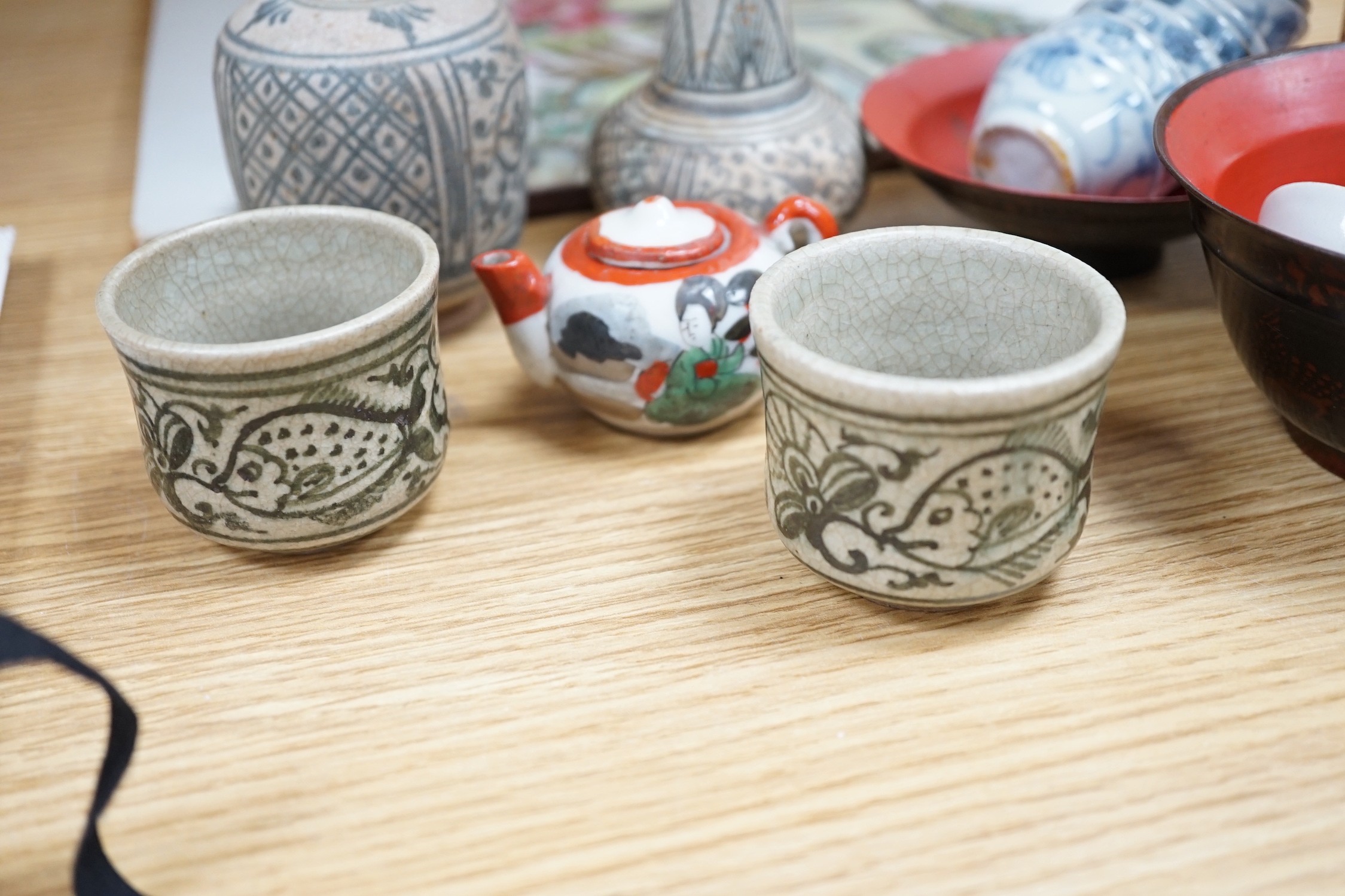 A Chinese porcelain plaque, 36 x 27.5cm, two Thai small vases and cups, porcelain tea bowls, teapot etc